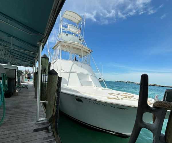 view of cancun charter fishing boat front from marina dock