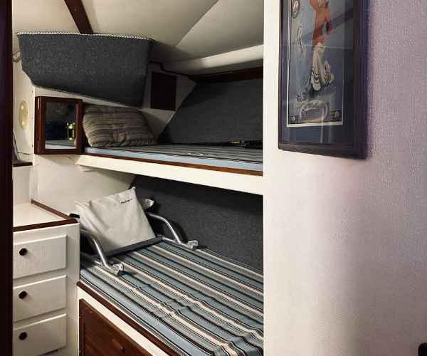 inside cancun charter fishing boat showing full bedroom